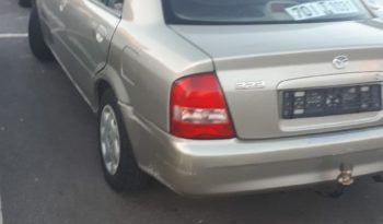 Mazda 323 2003 полный