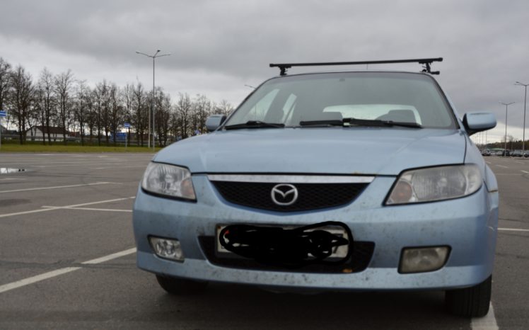 Mazda 323 2001 полный